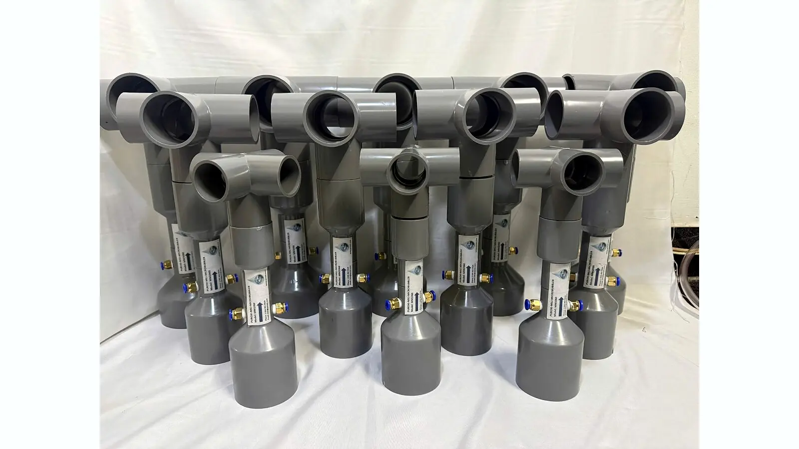 Multiple Puroxi multi-port nano bubble nozzle assemblies arranged for project installation.
